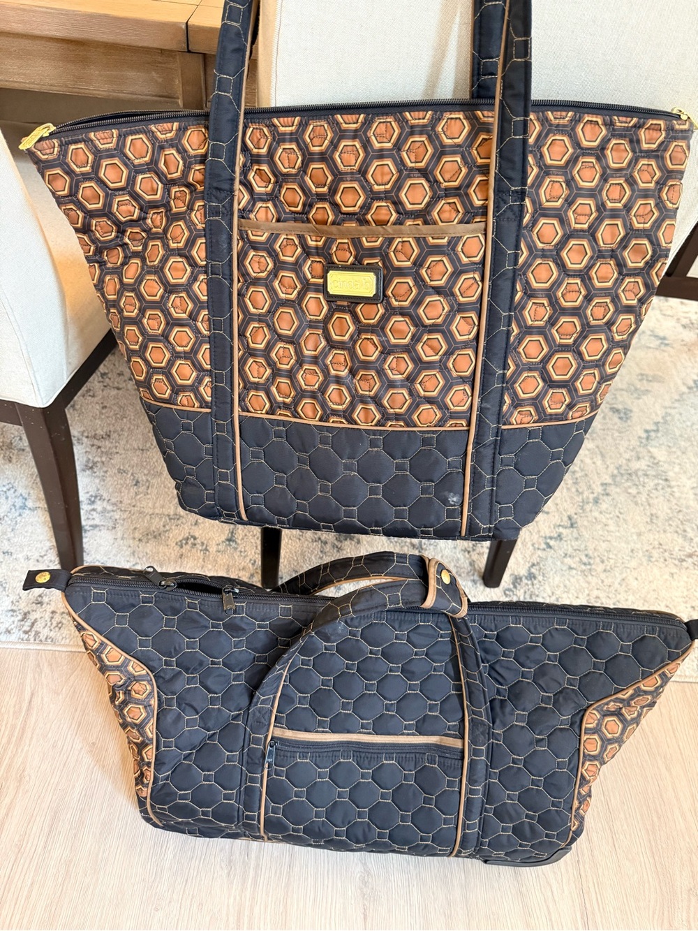 Cinda B tortoise Quilted Hex Print Tote and Travel Bags